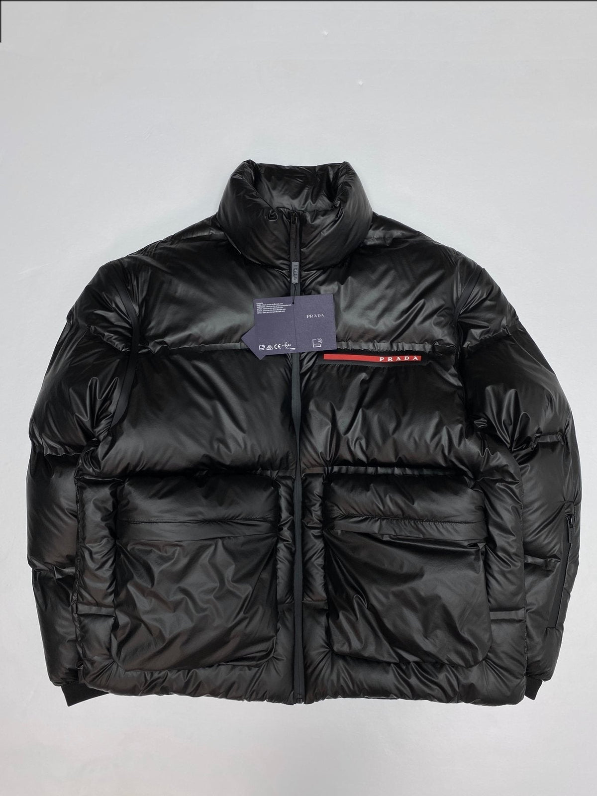 Prada Black Convertible Puffer Jacket with Red Chest Stripe