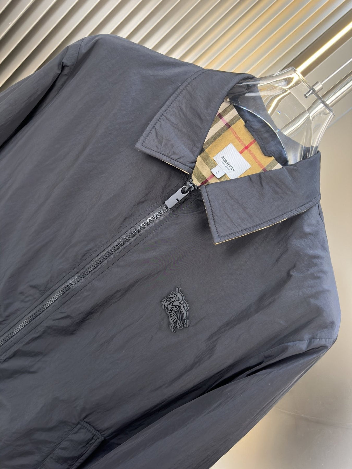 Moncler Black Zip-Front Jacket with Checked Lining