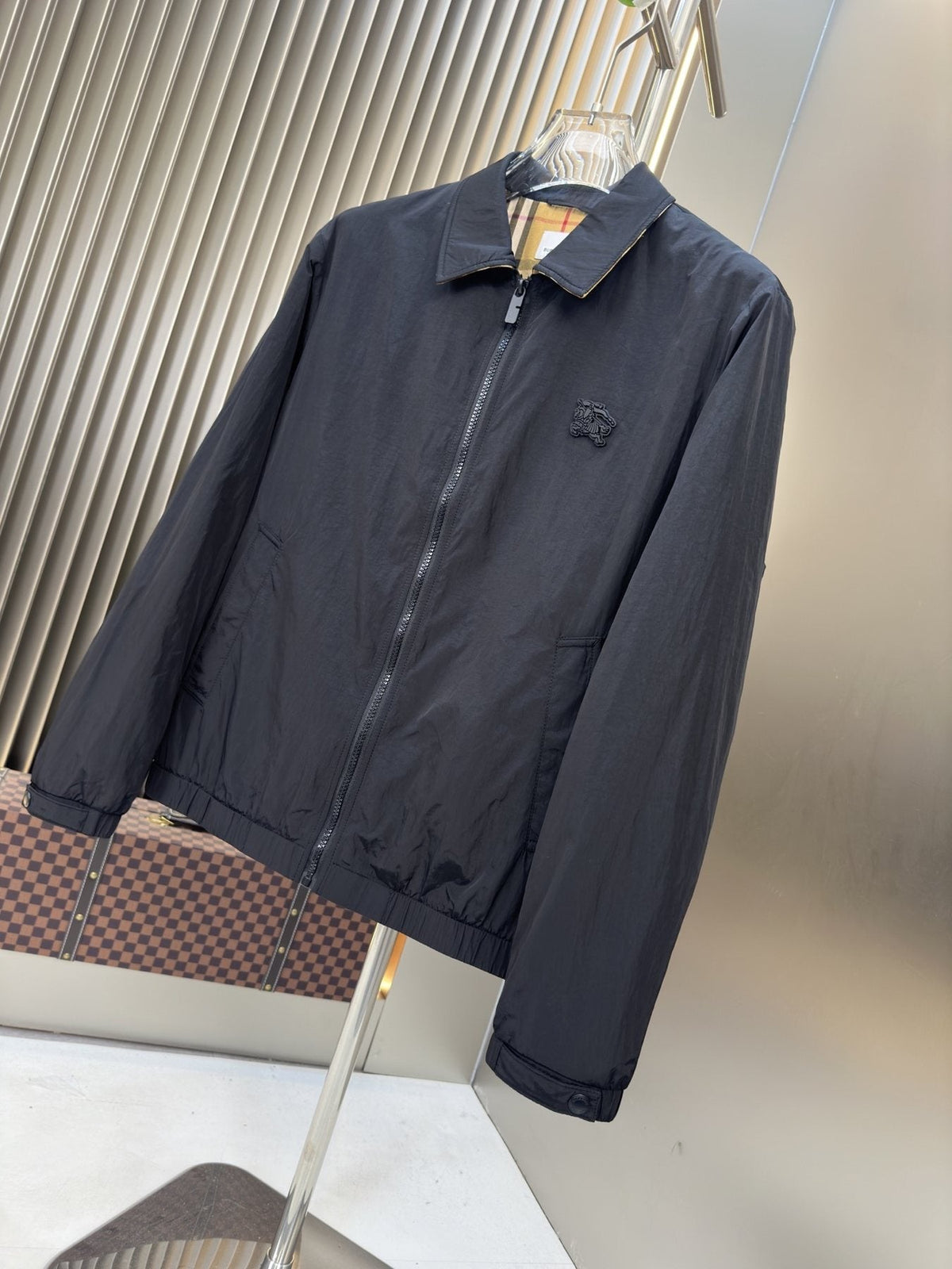 Moncler Black Zip-Front Jacket with Checked Lining